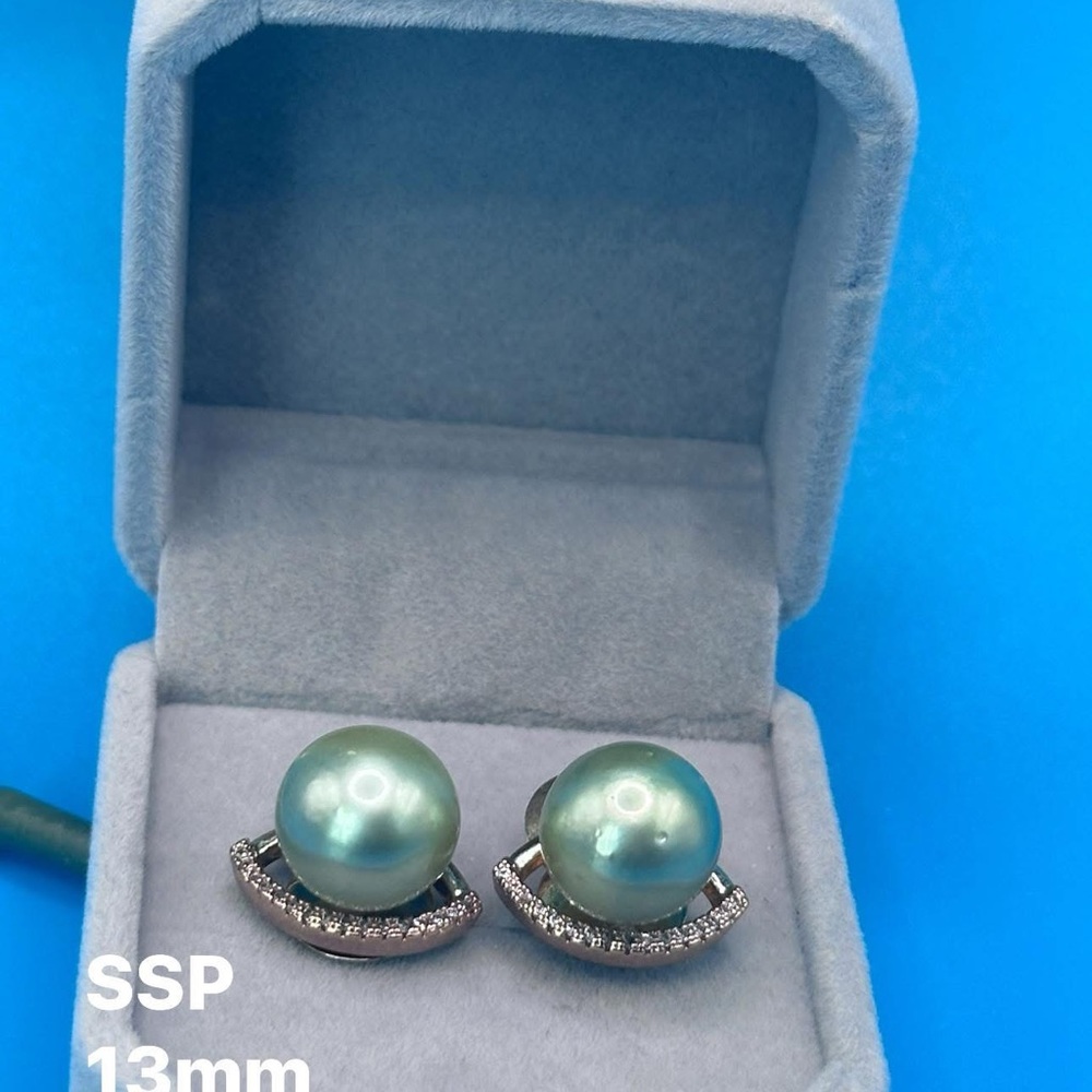 Elegant South sea pearl earrings 12mm in micron settings